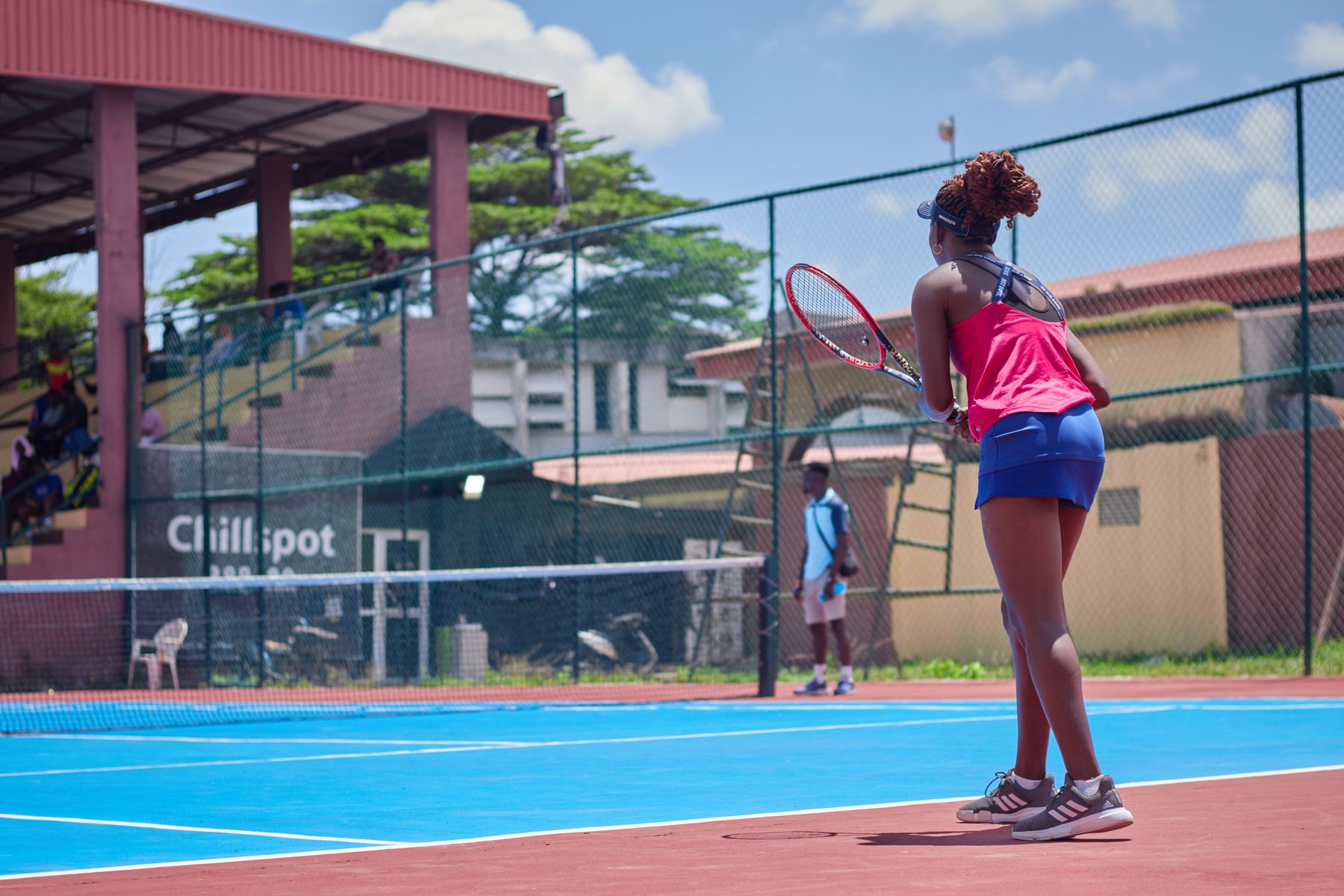 Tennis players on an outdoor court, illustrative sport photography